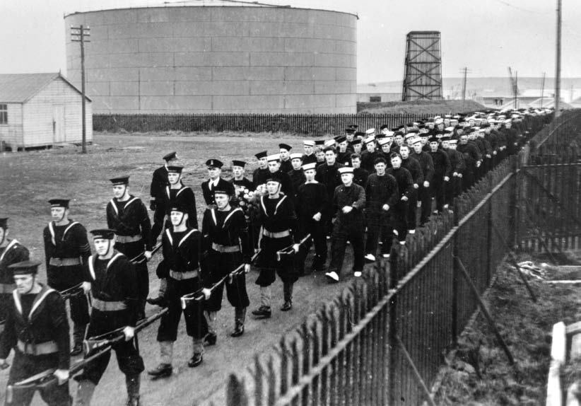 HMS Royal Oak funeral procession - note the survivors who are not in uniform