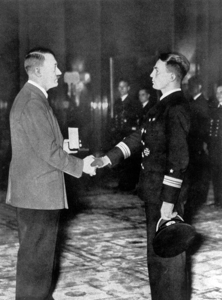 Prien being awarded the Knight’s Cross of the Iron Cross by Hitler.