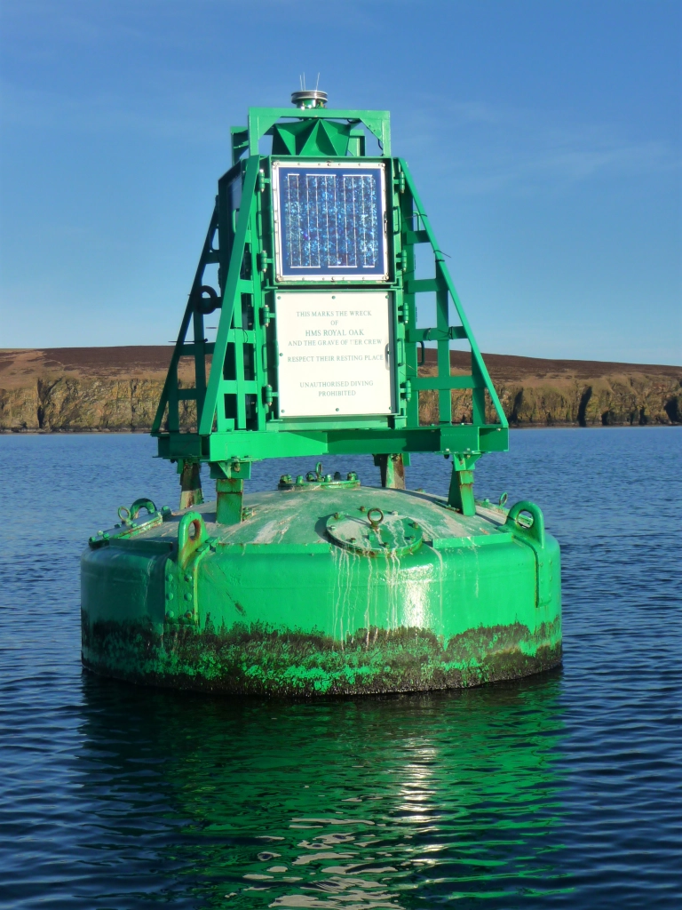 The buoy marking the wreck of HMS Royal Oak. It is a war grave and diving is prohibited.